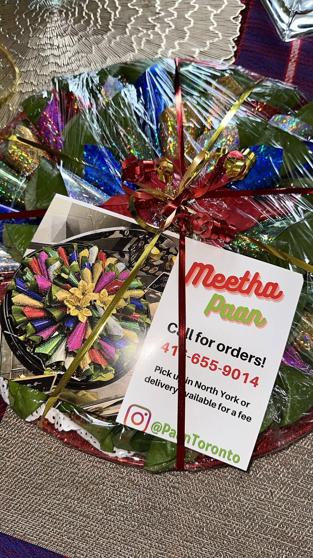 Gift-wrapped paan platter with Meetha Paan order card